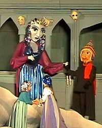 Giant puupets with human children